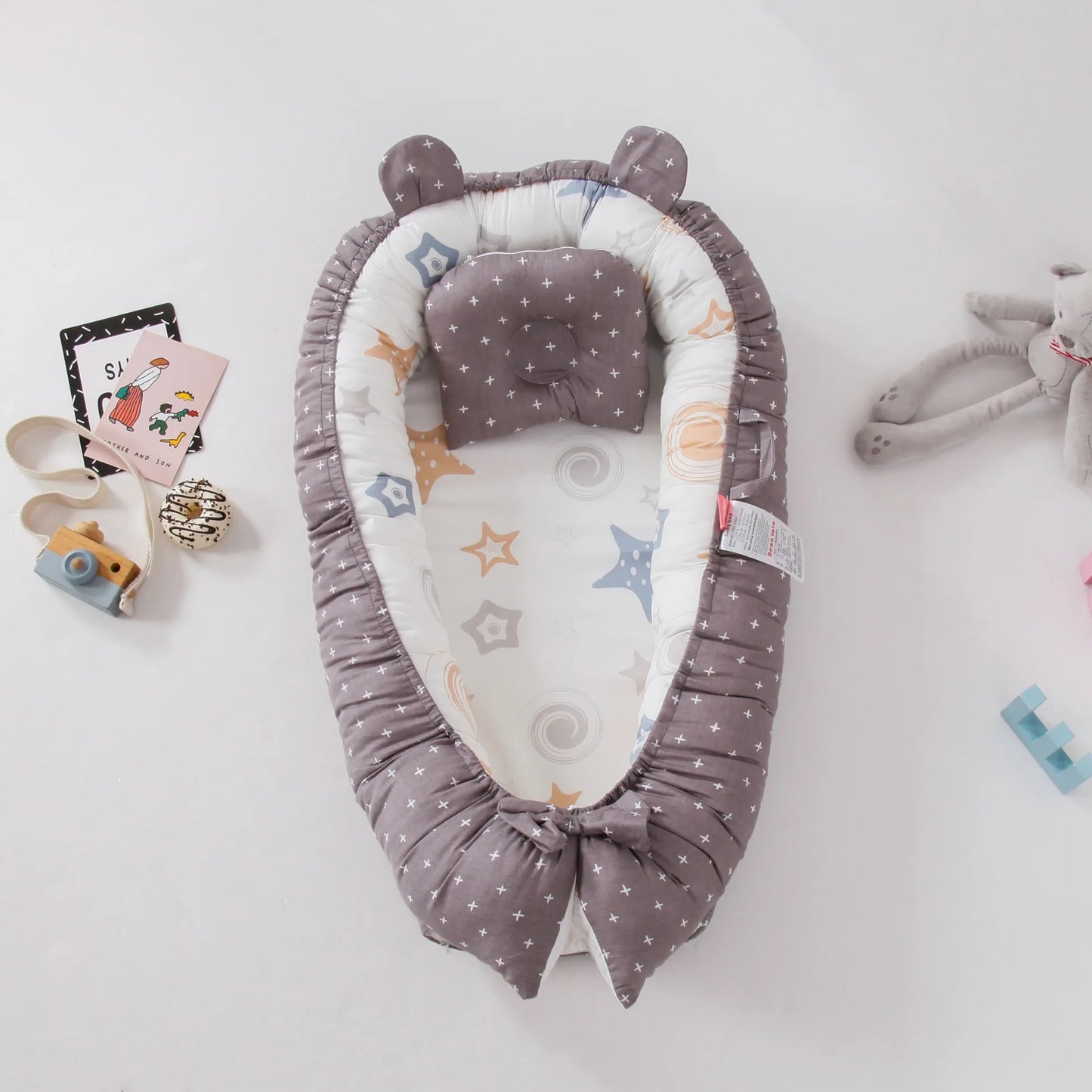 cocon our bebe reducteur lit pour limiter reveil nocturne