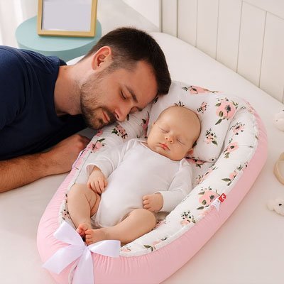 Est-il dangereux d'utiliser un réducteur de lit pour bébé?
