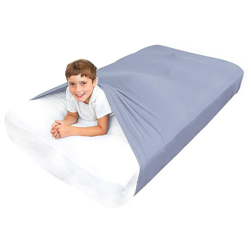 Couverture lestée enfant | Drap de compression Couv'calme™