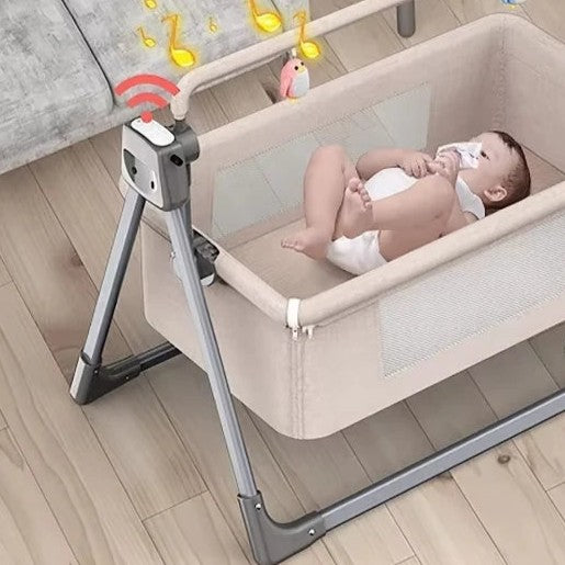 bebe dans berceau bébé electrique