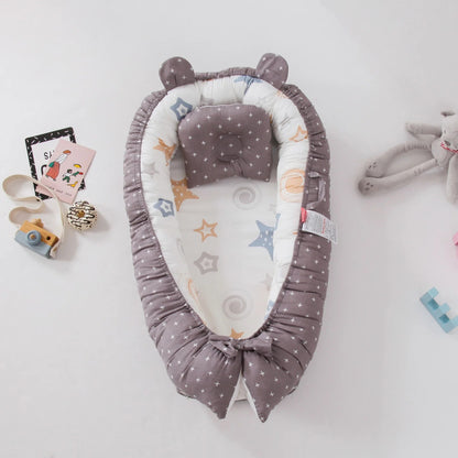 cocon our bebe reducteur lit pour limiter reveil nocturne