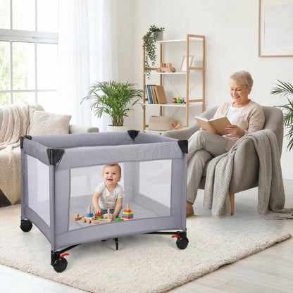 lit parapluie nomade pour vacances leger gris clair