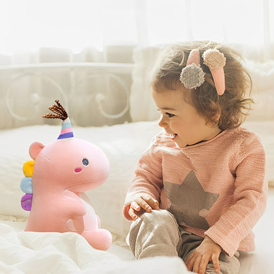 peluche dinosaure rose