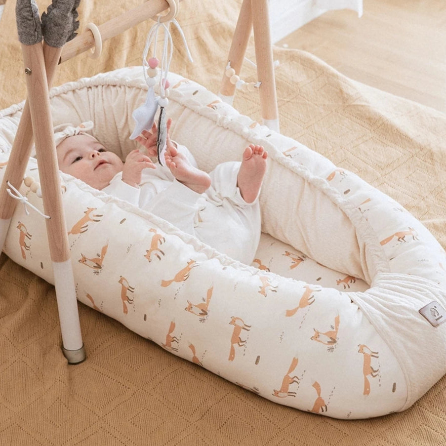 reducteur de lit bebe ajustable