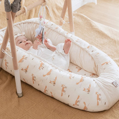 reducteur de lit bebe ajustable