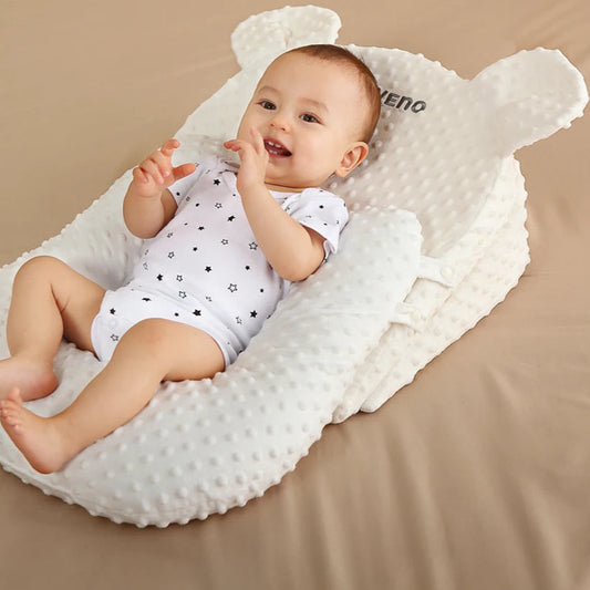 reducteur-de-lit-bebe-pour-reflux