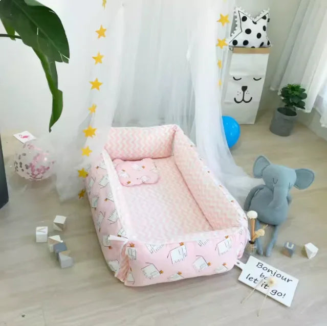 reducteur de lit bebe elephant rose