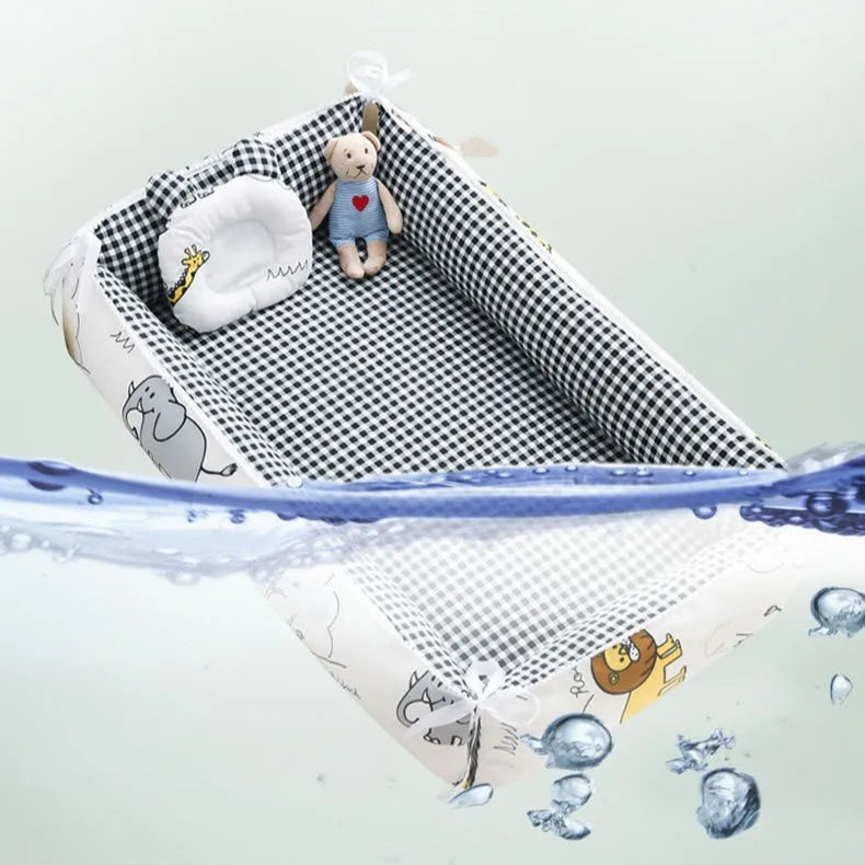reducteur de lit-bebe-lavable