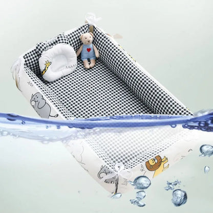 reducteur de lit-bebe-lavable