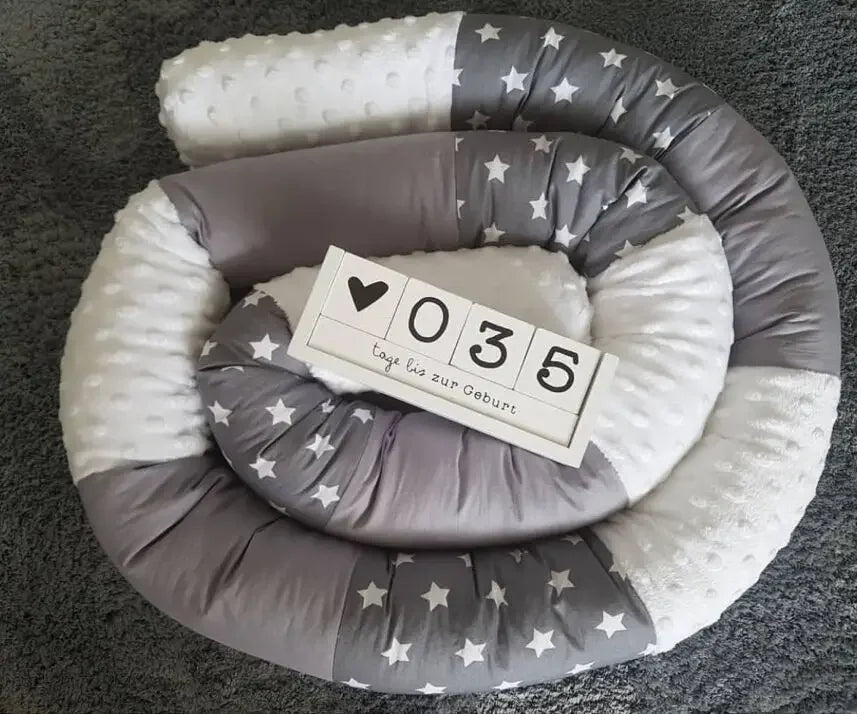 tour de lit bebe enroulé gris avec étoiles